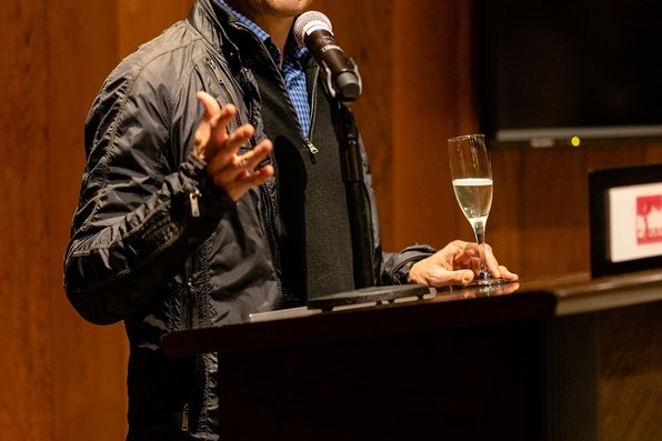 A person speaks at the podium.
