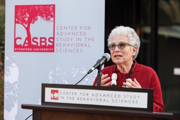 Margaret Levi speaking at the lectern