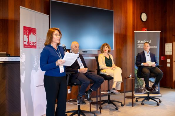 CASBS director Lara Tiedens tees up the event and introduces moderator