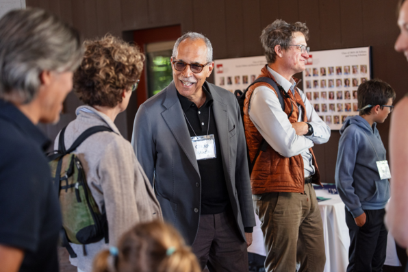 Claude Steele seen mingling during the reception before the event