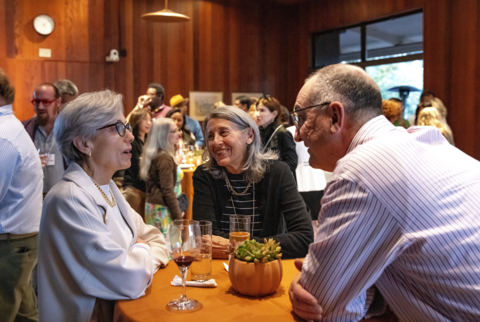 Reception attendees Abby Smith Rumsey, Roberta Katz, and Fred Turner