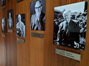 Black and white photos of men involved in CASBS’s history on the wall in their offices