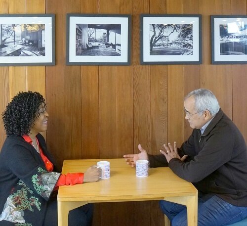 Brenda Stevenson sits with Arnold Rampersad over coffee
