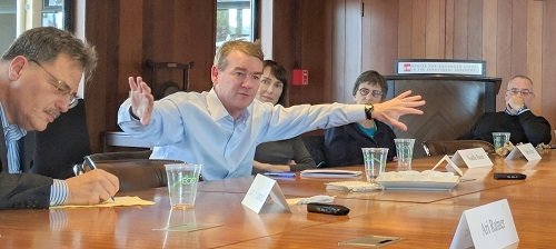 U.S. Senator Michael Bennet of Colorado speaks to CASBS at a conference table