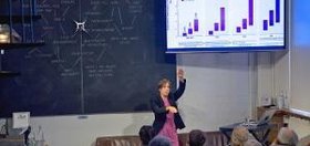 A researcher presenting a slide