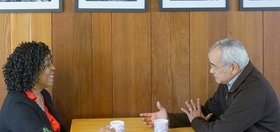 Brenda Stevenson sits with Arnold Rampersad over coffee